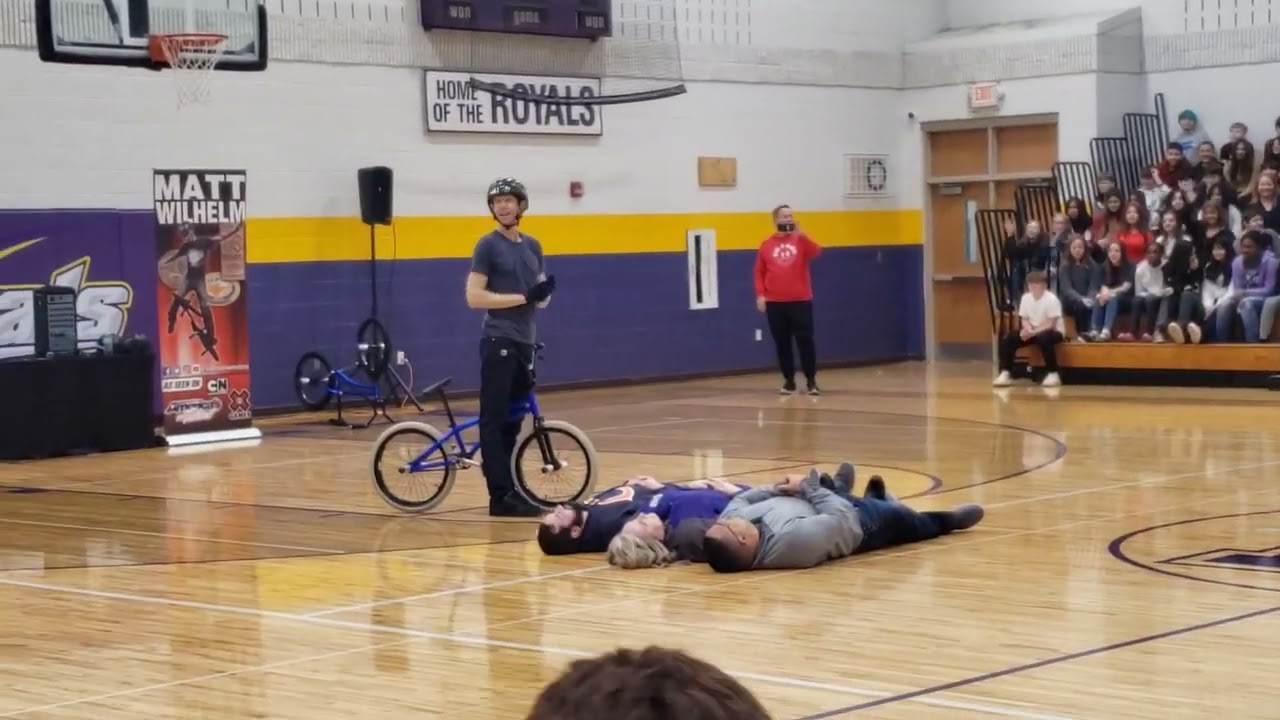 Matt Wilhelm jumps over RMS teachers