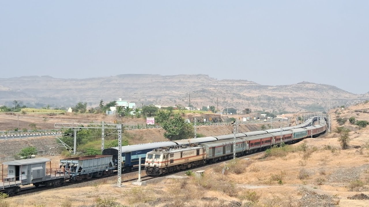 Insane Train Crossing 🔥 BZA WAP-7 Sampark Kranti Meets EMD hauled NMG Freight | Daundaj Khind