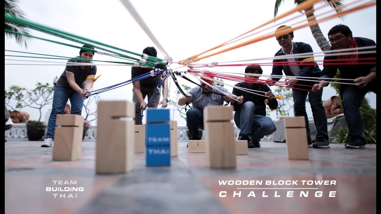 Wooden block tower challenge outdoor team building activity for corporate event in Bangkok Thailand