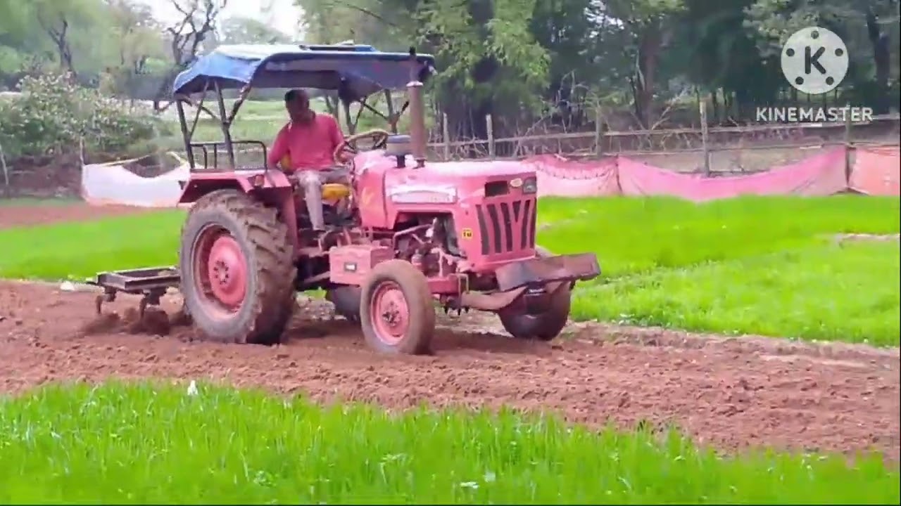 Mahindra B275 DI Tractor working in field bby cultivation for preparing the rice planter