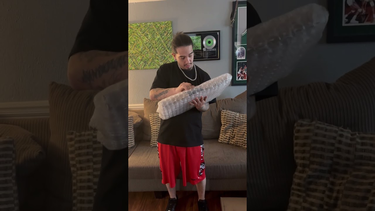 Restlezz opening his iTunes plaque for his single &lsquo;Learn the Game&rsquo; #hiphopartists #itunes