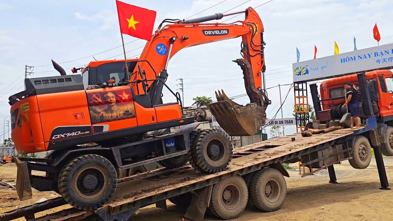 MÁY XÚC LỐP HOA HẬU DOOSAN 140-5 ĐỜI 2018 LÊN PHOỌC ĐI DỰ ÁN MỚI | MÁY XÚC TRIỆU VIEWS