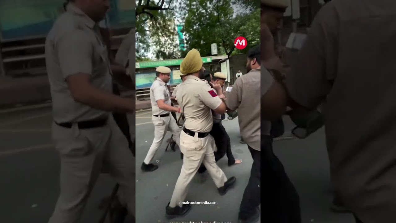 Ребенок плачет, пока отца задерживают во время протеста в Дели | Протест CJP | Дели | Maktoob