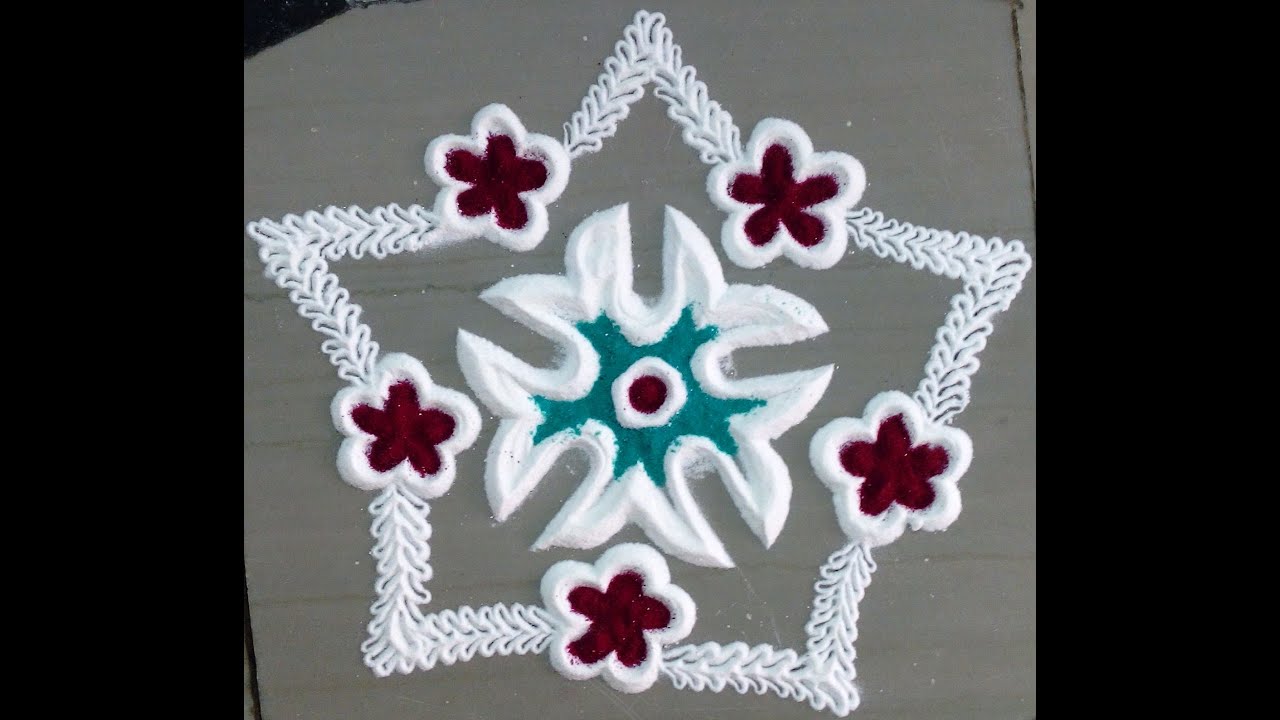 Colourful Art of Rangoli with Flowers and Leaves