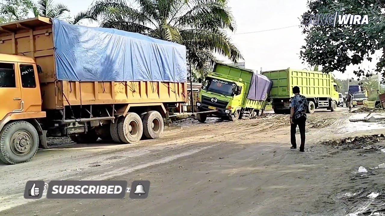 Dramatic Evacuation of a Coal Truck Trapped in a Pothole-Ridden Road, Steel Cable Snaps
