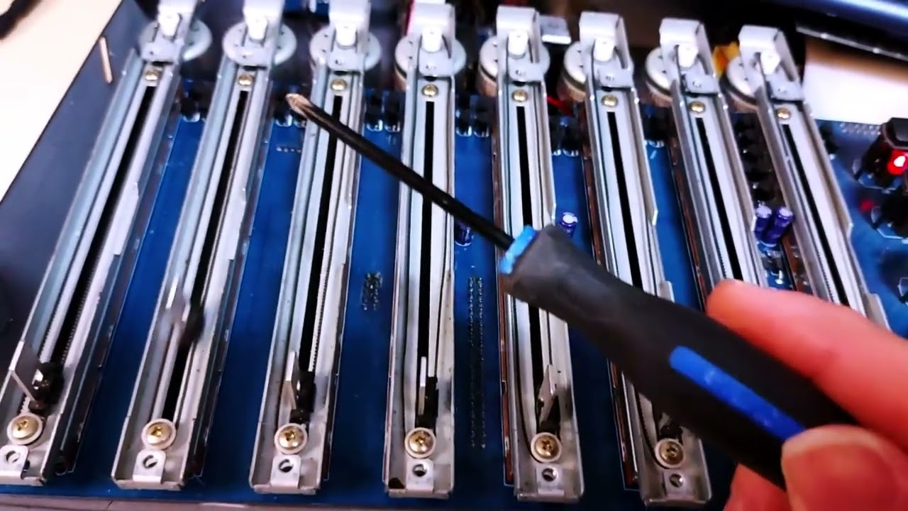 Noisy Behringer BCF2000 repair (techniques will work for other moving fader devices)