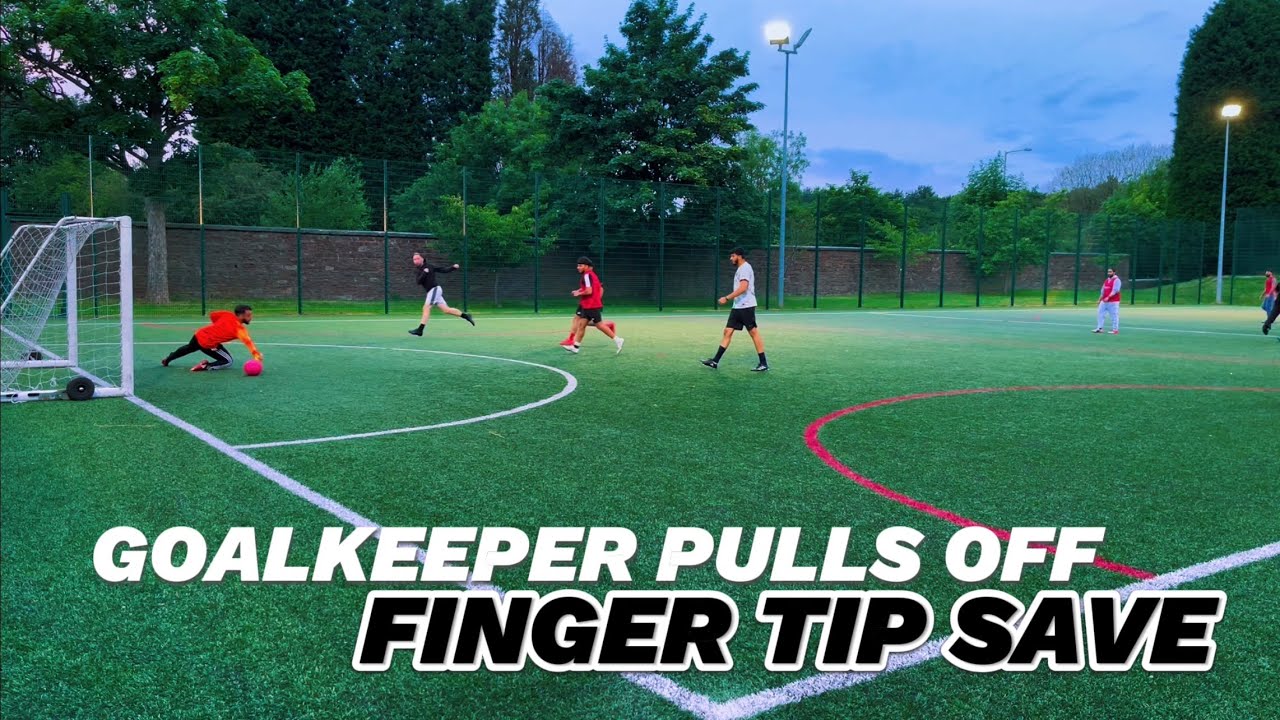 GOALKEEPER PULLING OUT SAVES LEFT RIGHT CENTRE 