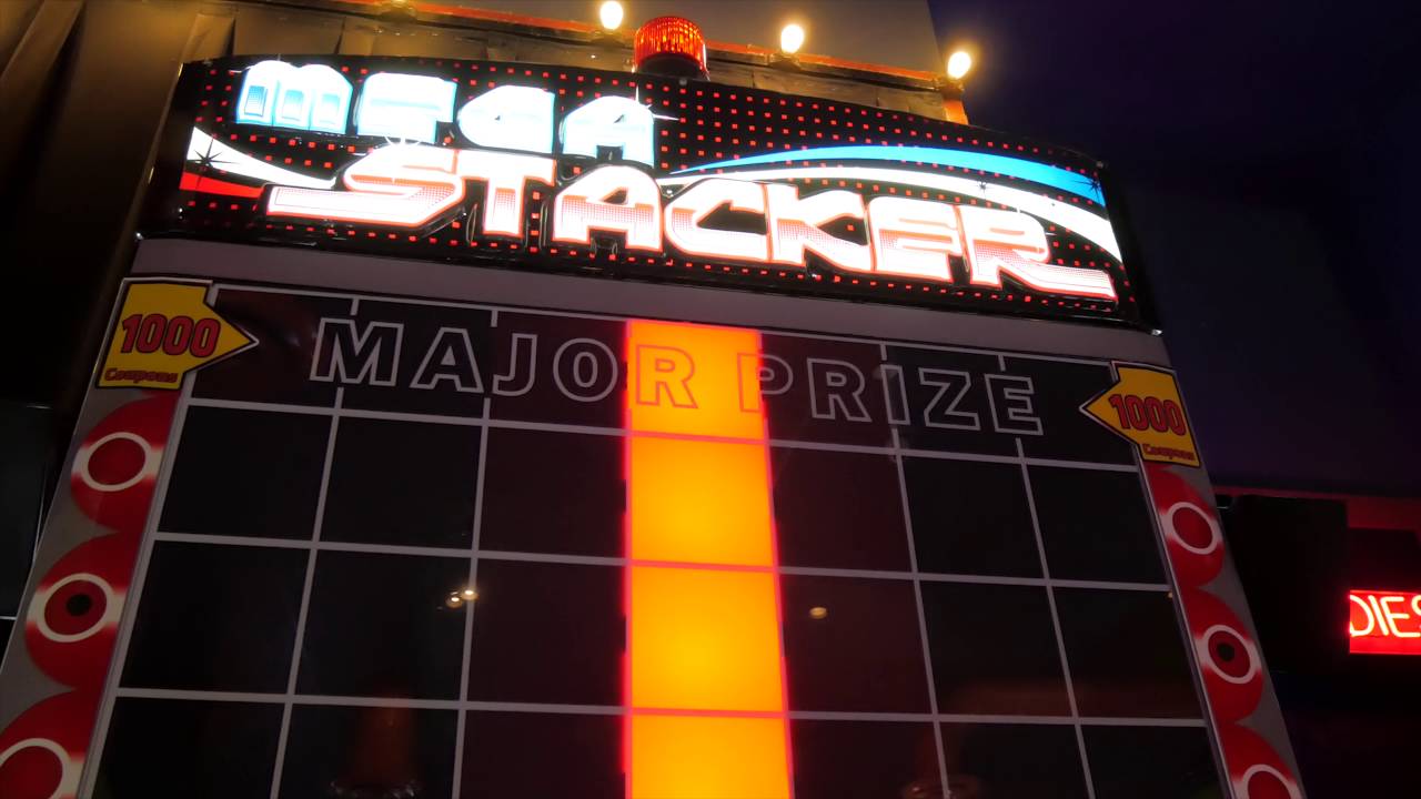 Big claw machine wins and ticket jackpots at Dave and Buster's! | The Crane Couple