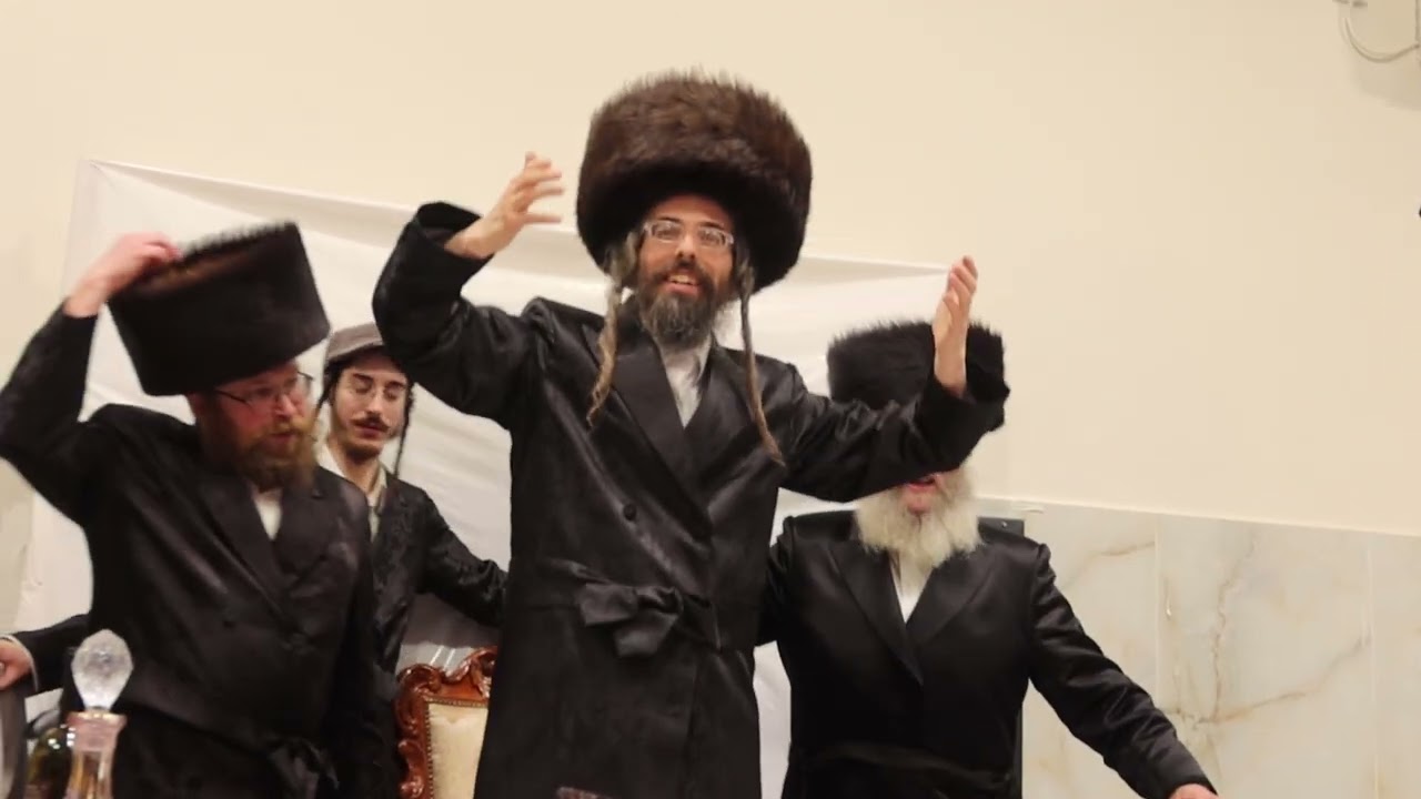 כ