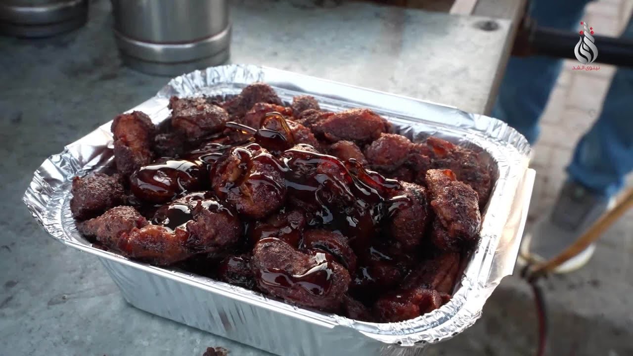 عربة باقلاء تلفت انتباه السائحين وكلِّ من يزور الموصل
