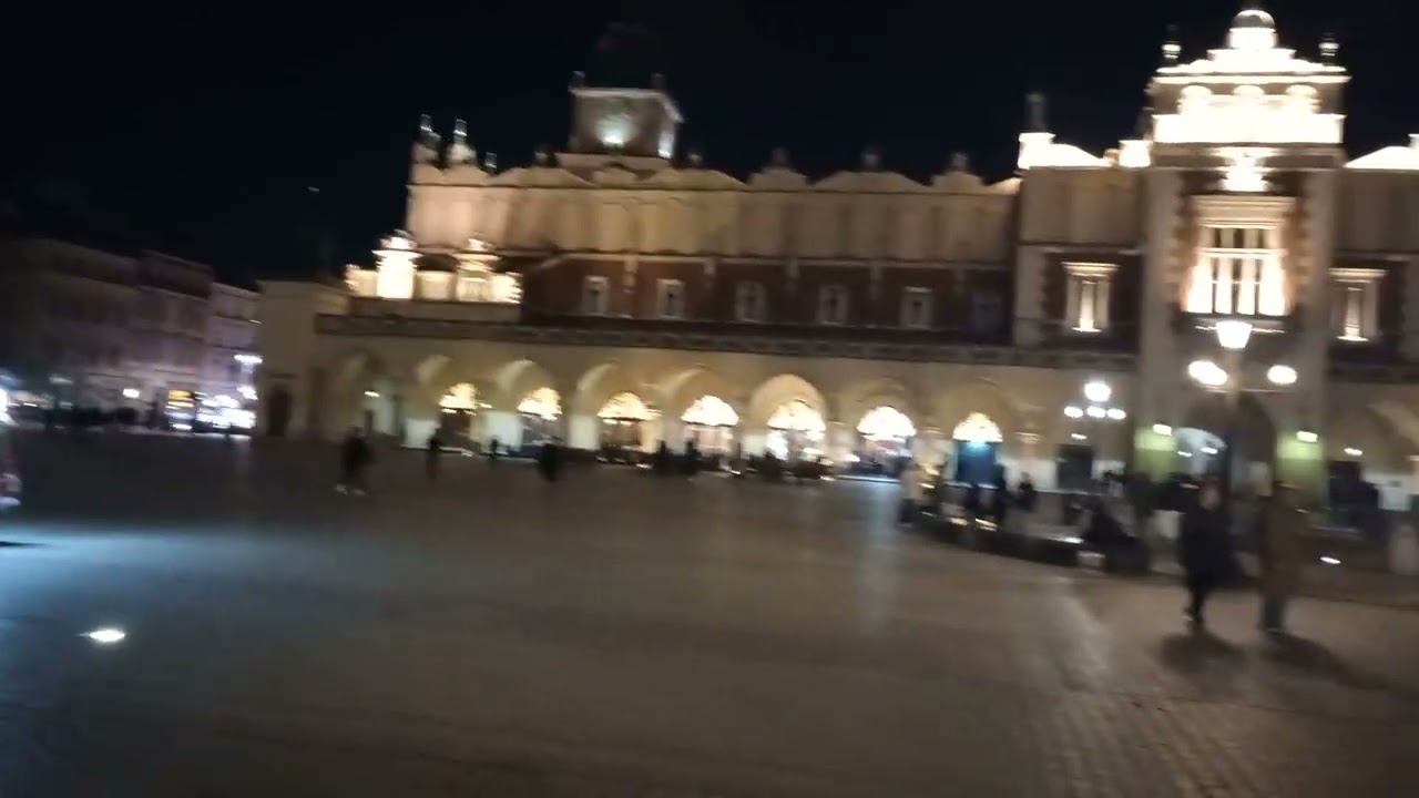 180 degree view of old town Krakow at night.