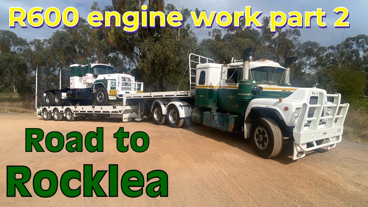 Mack R600, R700 and 1923 AC on the road to Rocklea
