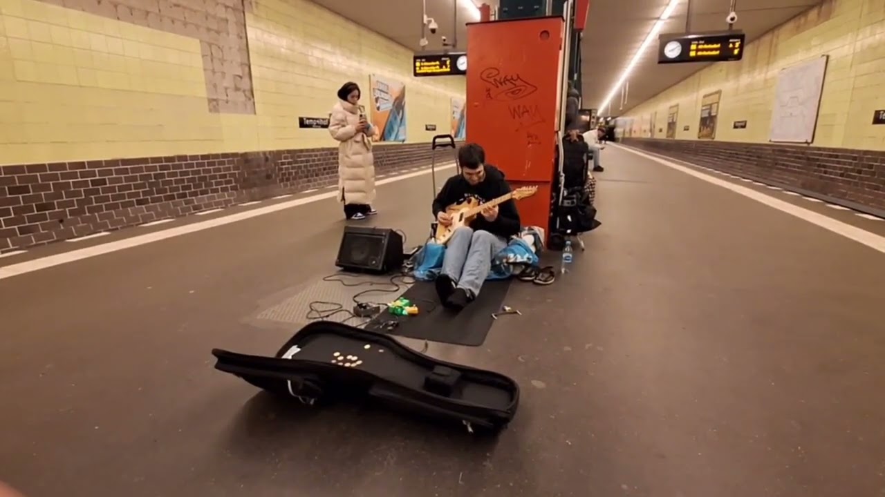 The Girl is shooting underground guitarist during lonely Shepherd James Last performance
