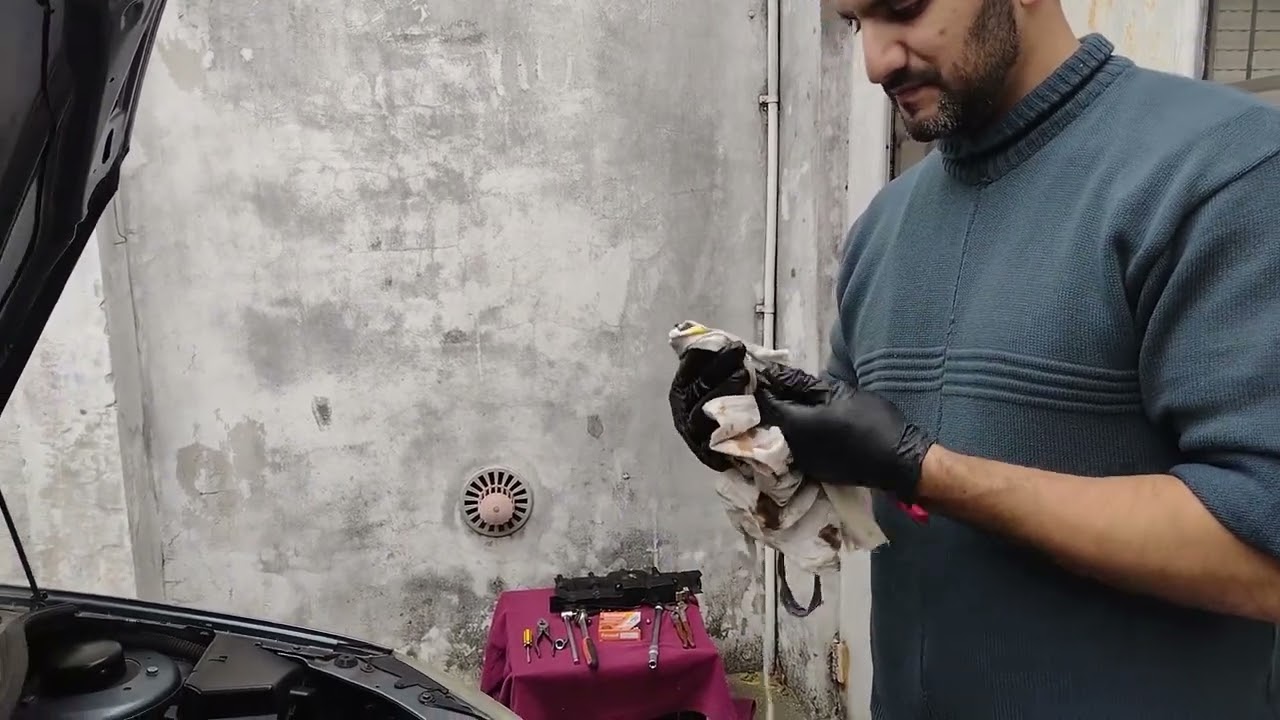 Como cambiar las bujias. Peugeot 206