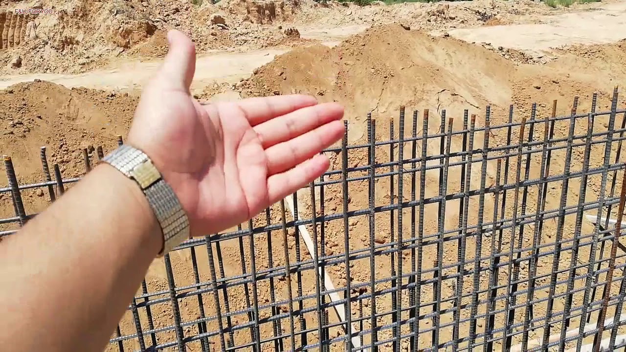 Retaining wall reinforcement construction