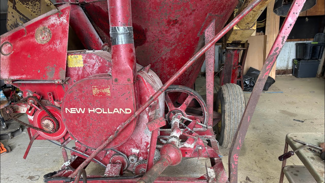 Repairs on a new holland 354 grinder mixer