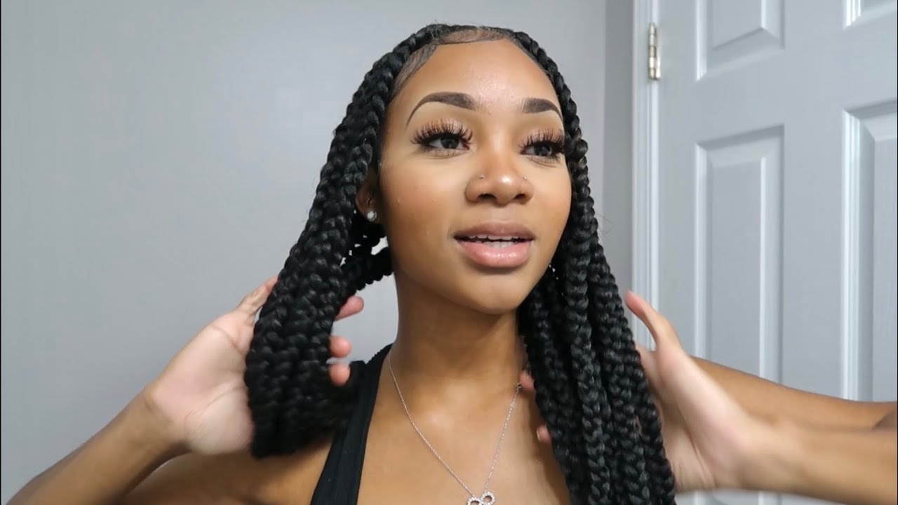 doing my own knotless braids for the first time *wasn’t easy lol*