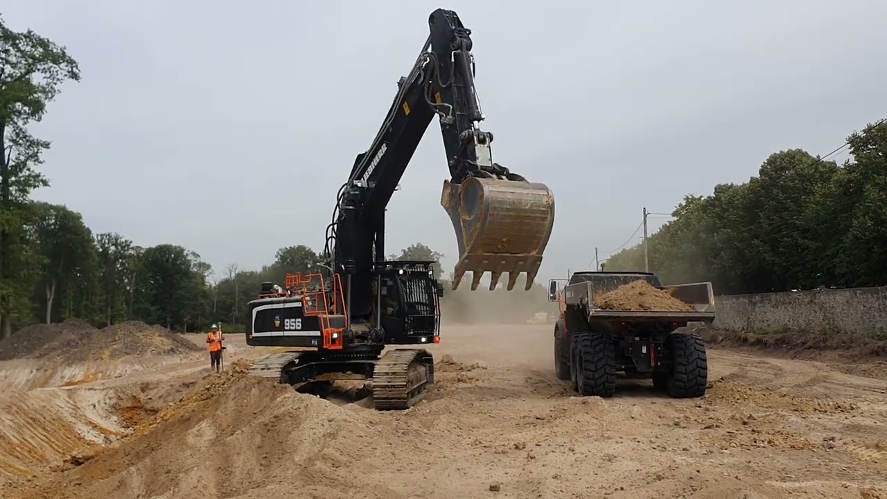 Liebherr R956 Wiame TP loading Volvo ADT A30G