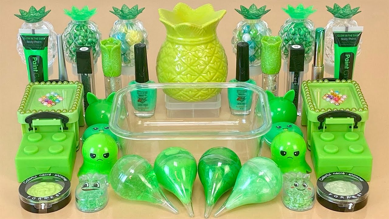 ASMR Slime 💚 Mixing ”GREEN” makeup, Eyeshadow, glitter into slime. Satisfying slime video.