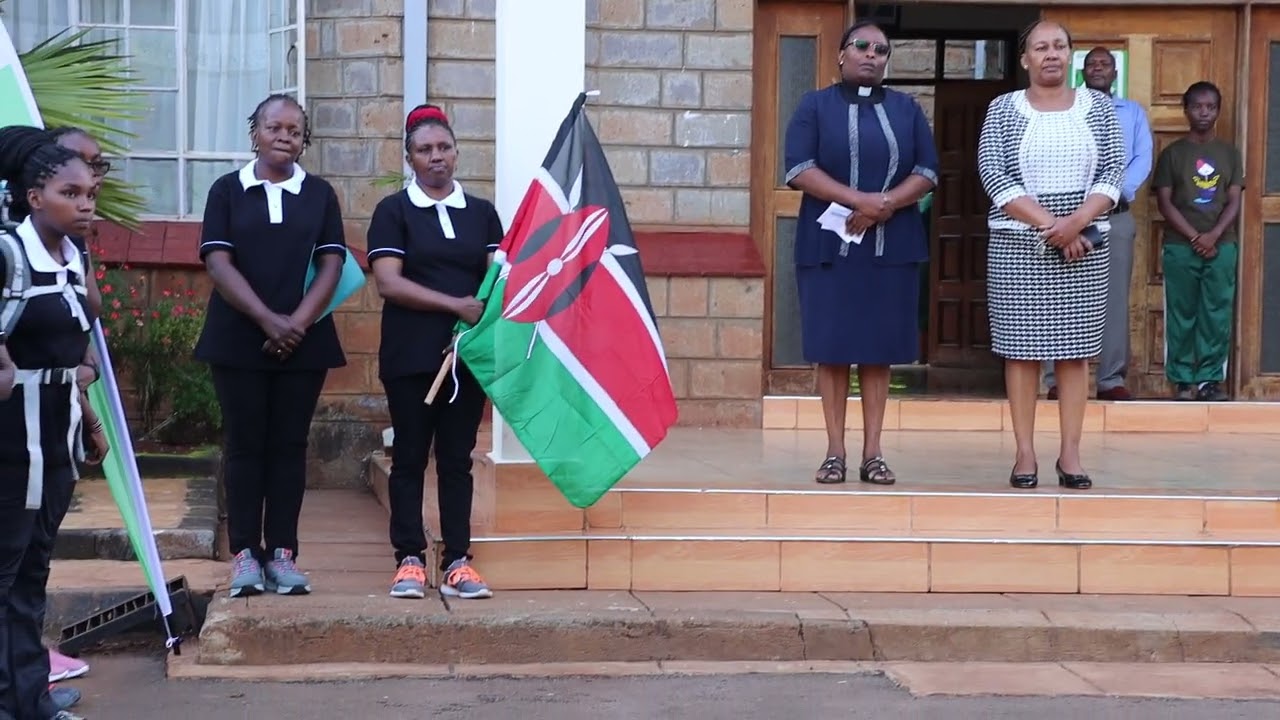 Chief principal of Alliance Girls High School Presiding over Gold level expedition Participants