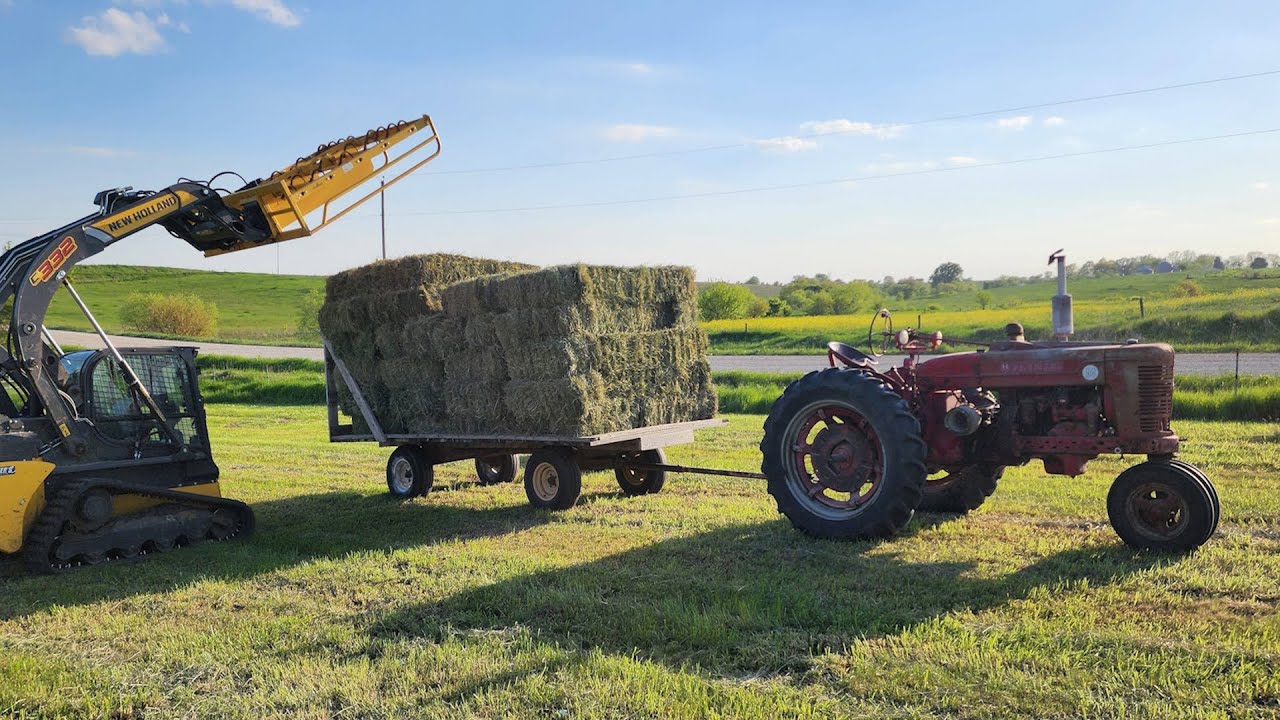 Farmall Tractors Raking, Baling, & Hauling Square Bales