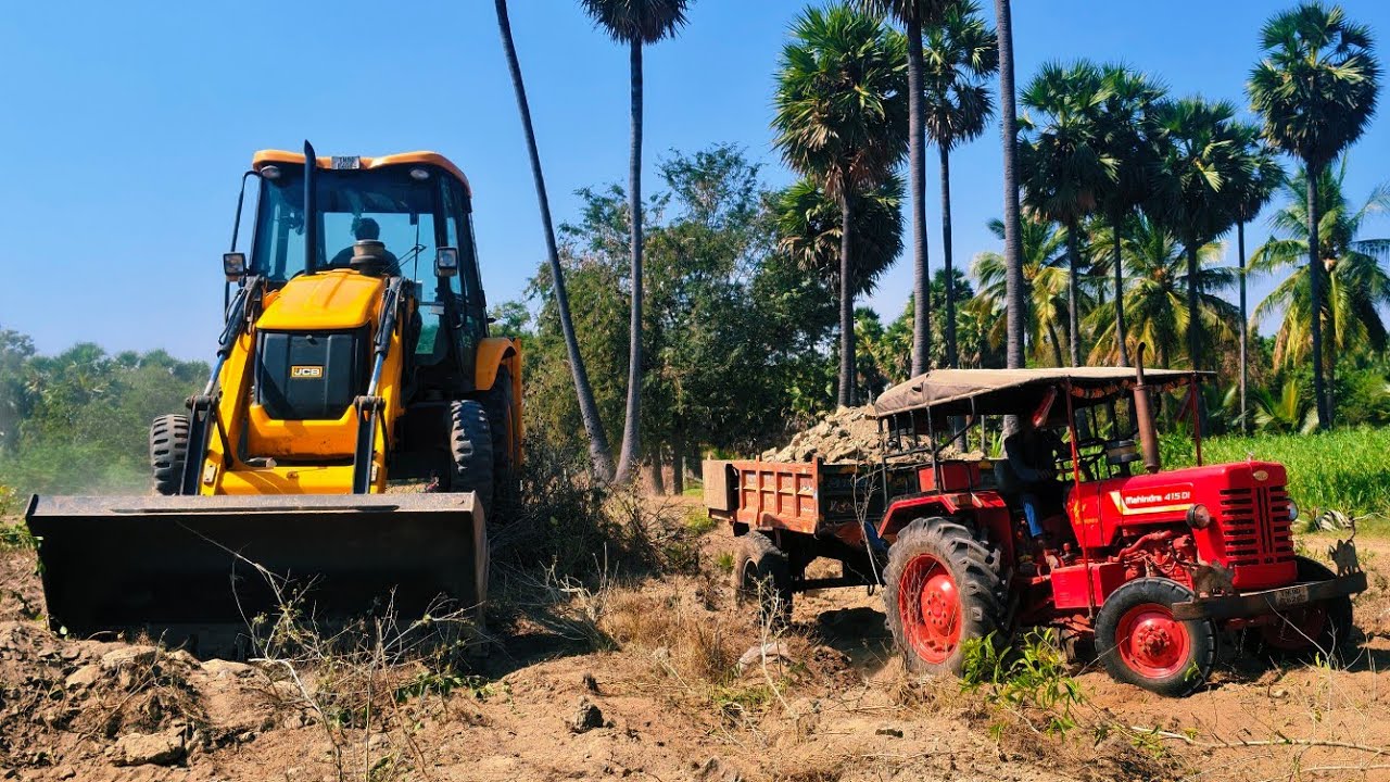 Jcb 3dx backhoe loading with mahindra 415 and mahindra 575 di tractors...