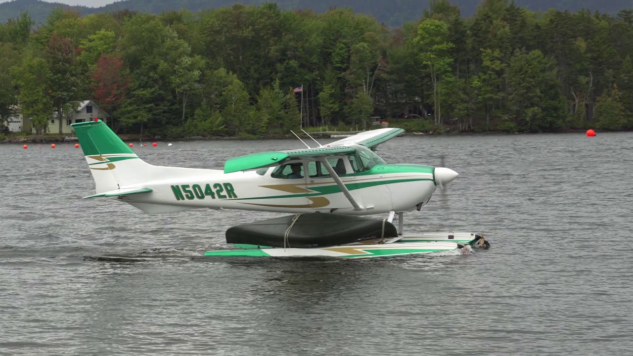 172M on floats hauling a canoe at the International Seaplane Convention