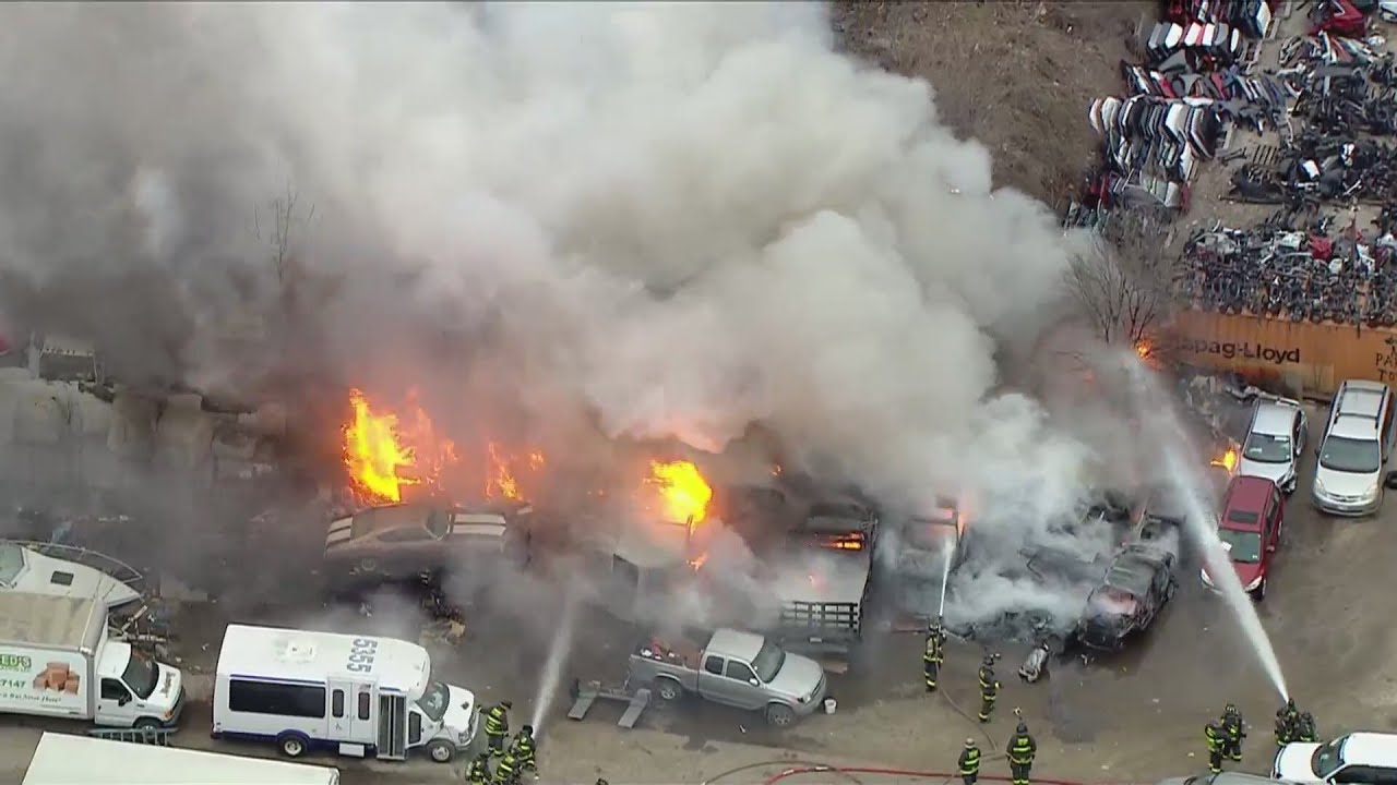 SkyCam9 over massive fire at Northwest Side auto yard