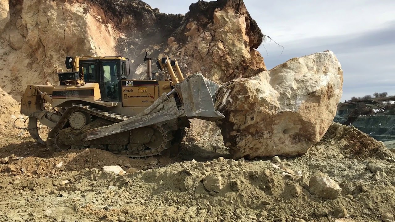 Caterpillar D8R Bulldozer Pushing Huge Stone - Labrianidis Mining Works