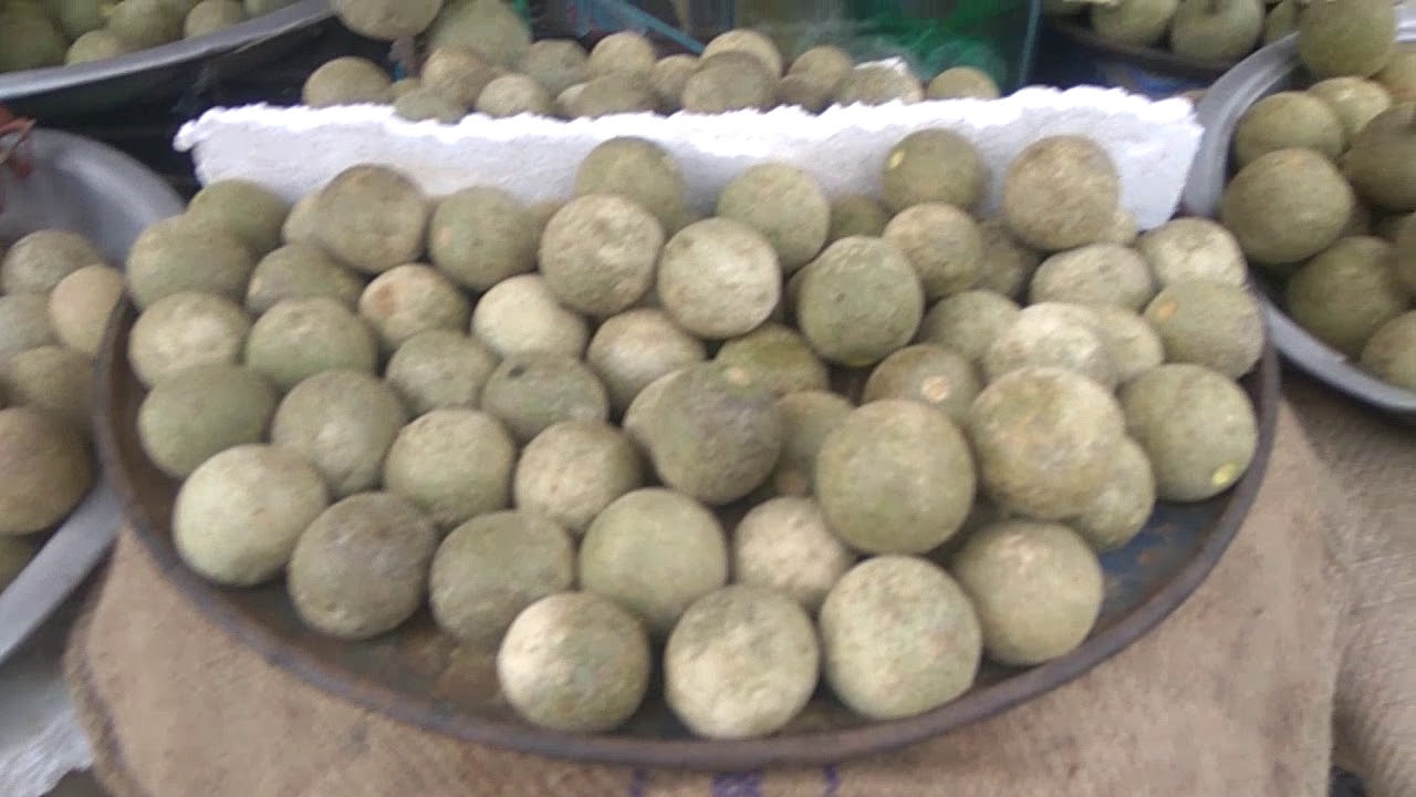 Yummy street fruits of wood apple#Tasty Masala Wood Apple# Street Food Wood Apple Fruit