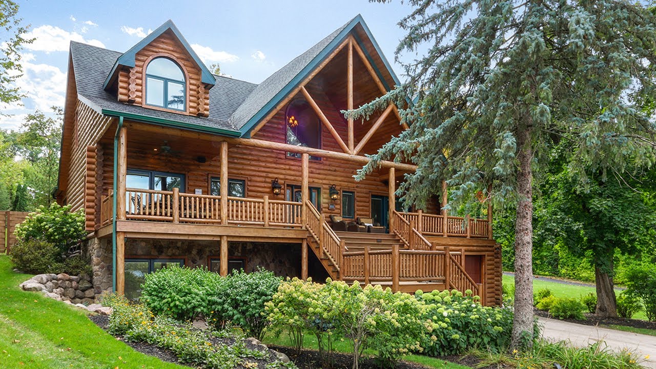 Like-New Lodge Style Home With Views of Geneva Lake and Transferable Boat Slip.