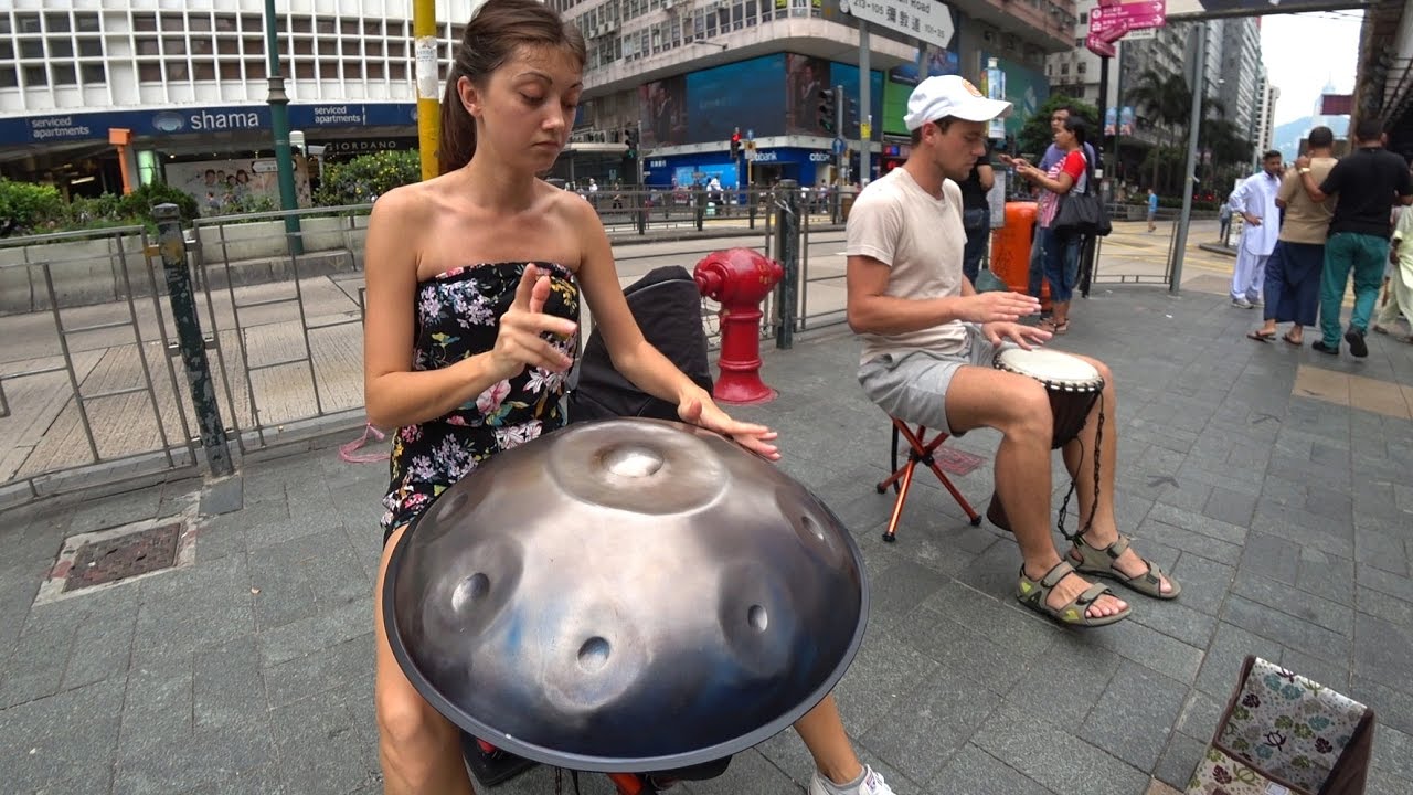 Ukrainian Handpan or Spacedrum players in Hong Kong Streets