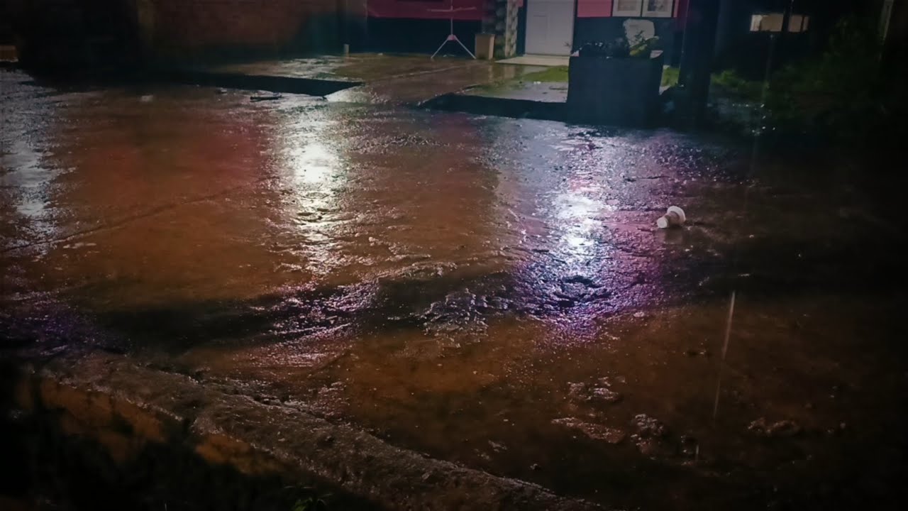 Full of energy to immediately fall asleep with heavy rain on the terrace of the house at night 