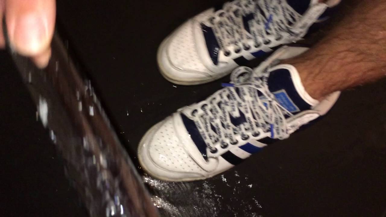 wet in a shower in Adidas Top Ten without socks