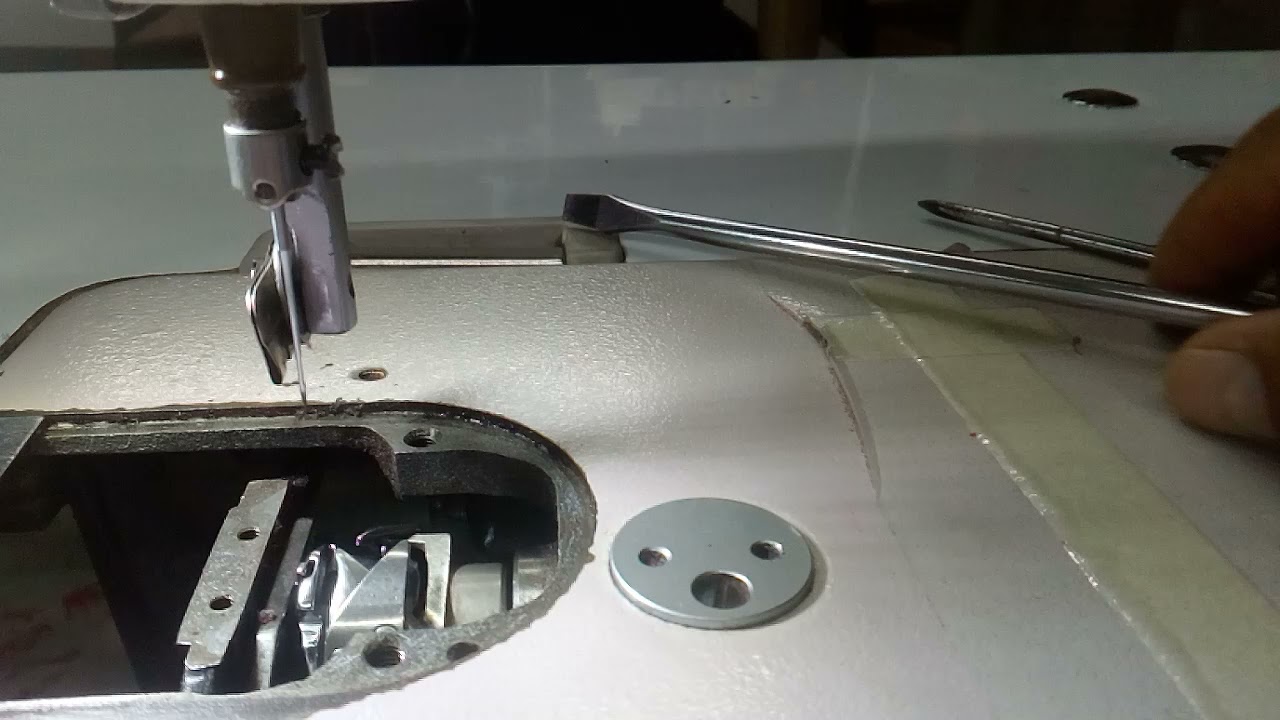Como centrar garfio con aguja maquina recta industrial