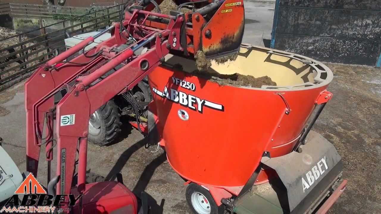 Abbey Machinery Rear Cross Elavator PVC Type behind Massey Ferguson  390T