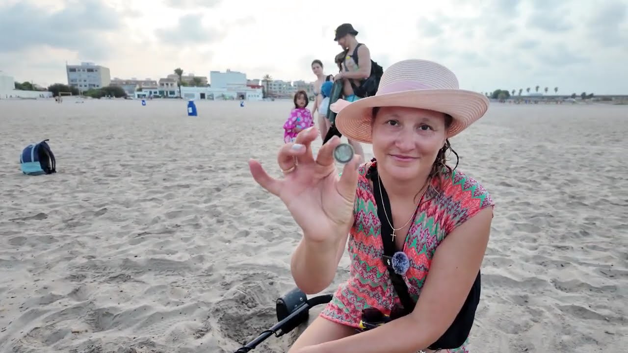 Buried Coin Found in the Sand During Coastal Detecting