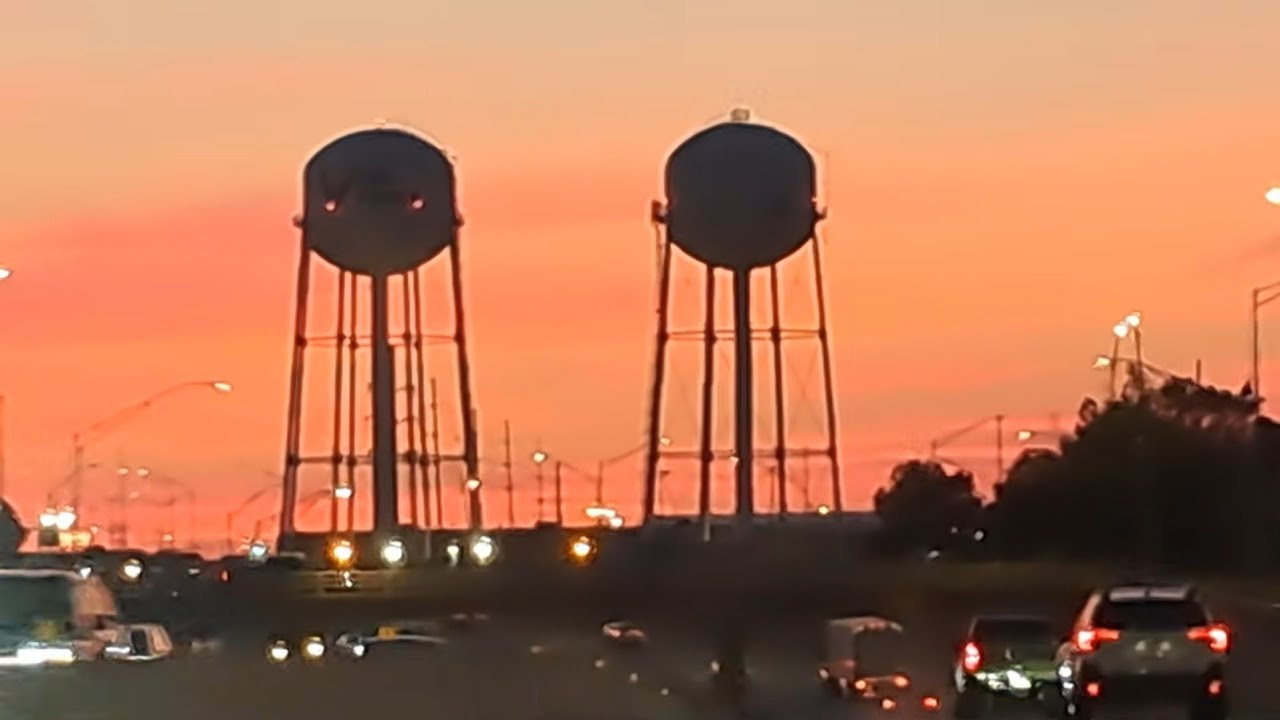 Driving Through OKC Oklahoma City, OK on I-40 E: Skyscrapers, Water Towers & Morning Sunrise