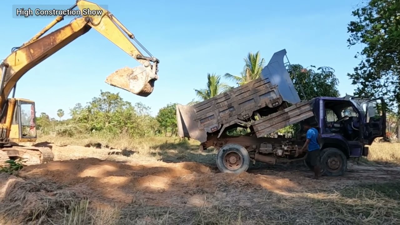 Excavator Pushing Soil & Dump Truck Loading | Construction Action