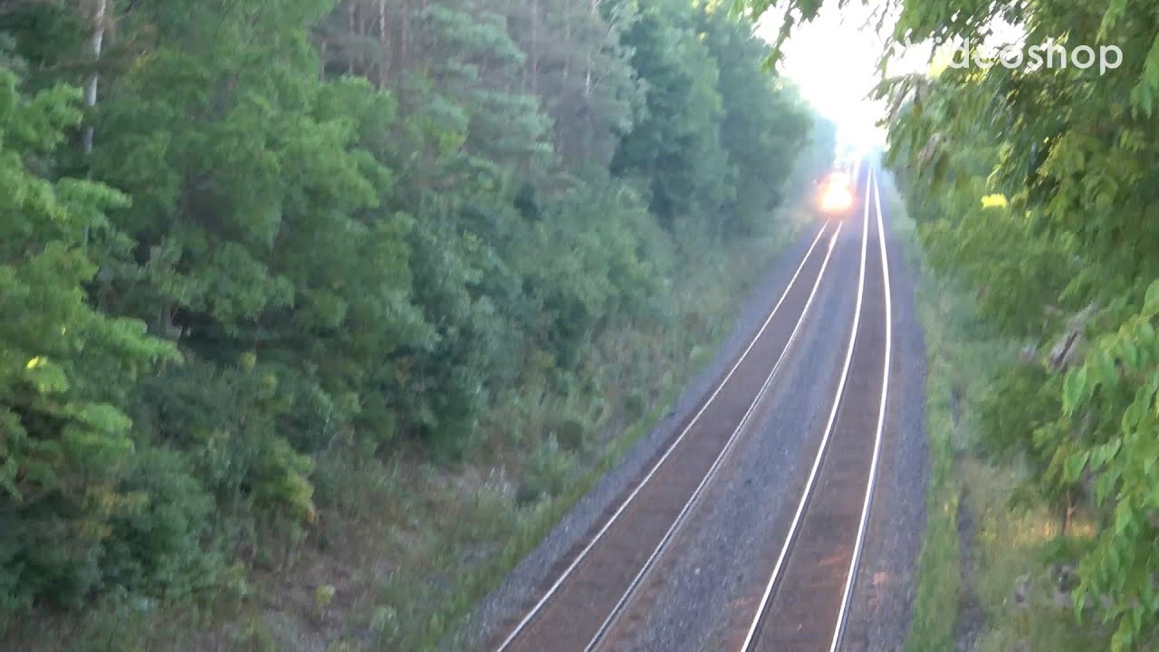 CN railway train 148 seen at Denfield Rd bridge. Power by locomotives 3865 & 5482.  292 axles.