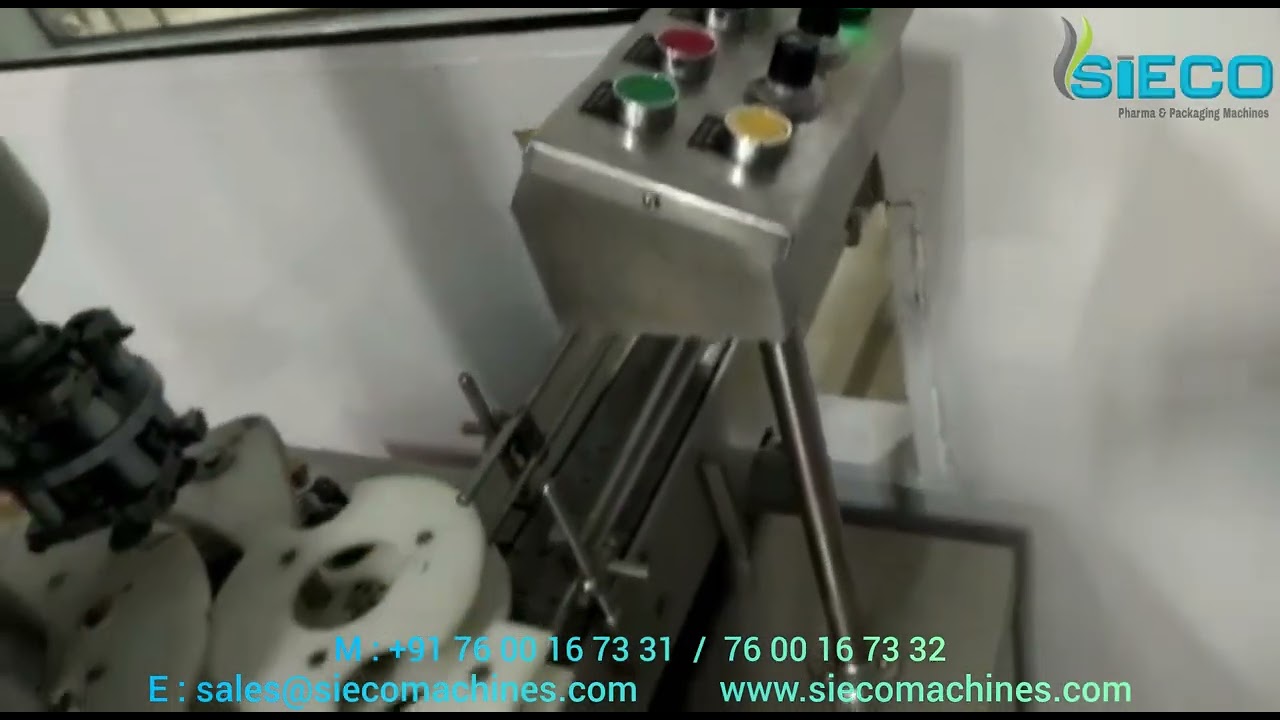 AUTOMATIC LIQUID FILLING AND ROPP/SCREW CAPPING / SEALING MACHINE