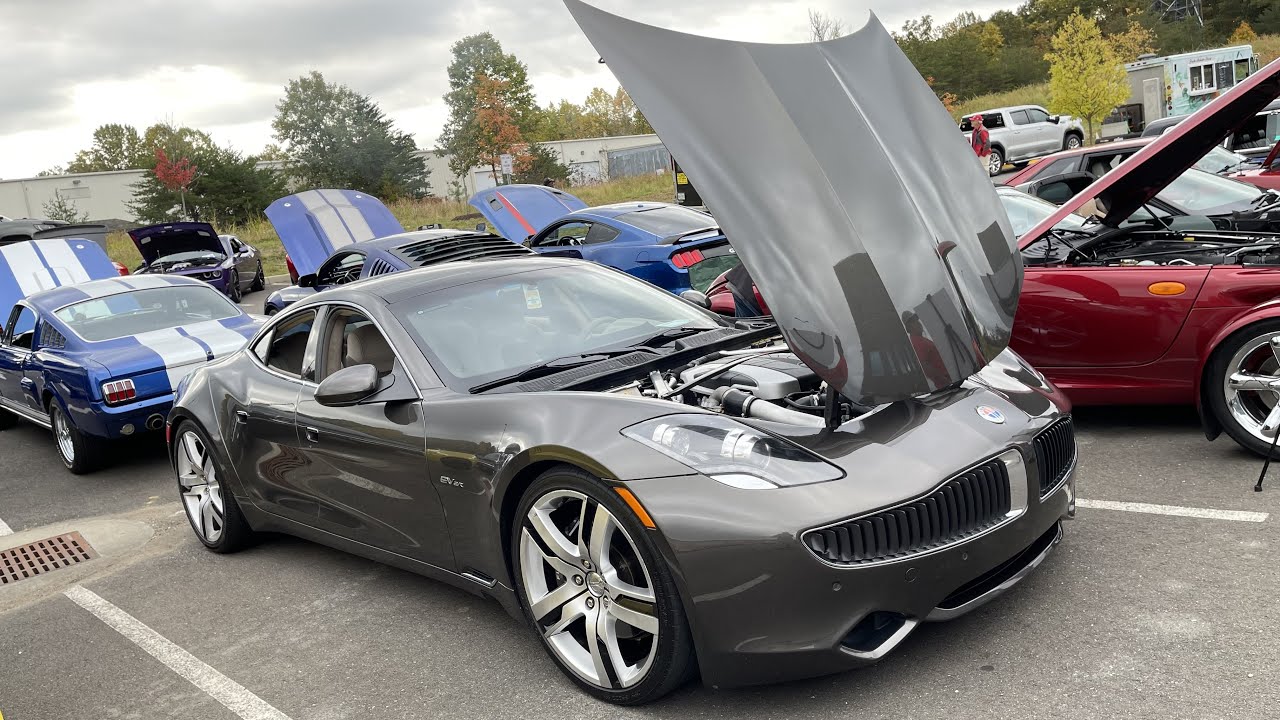 Какое удовольствие увидеть суперредкий Fisker Karma! Он выглядит невероятно чистым.