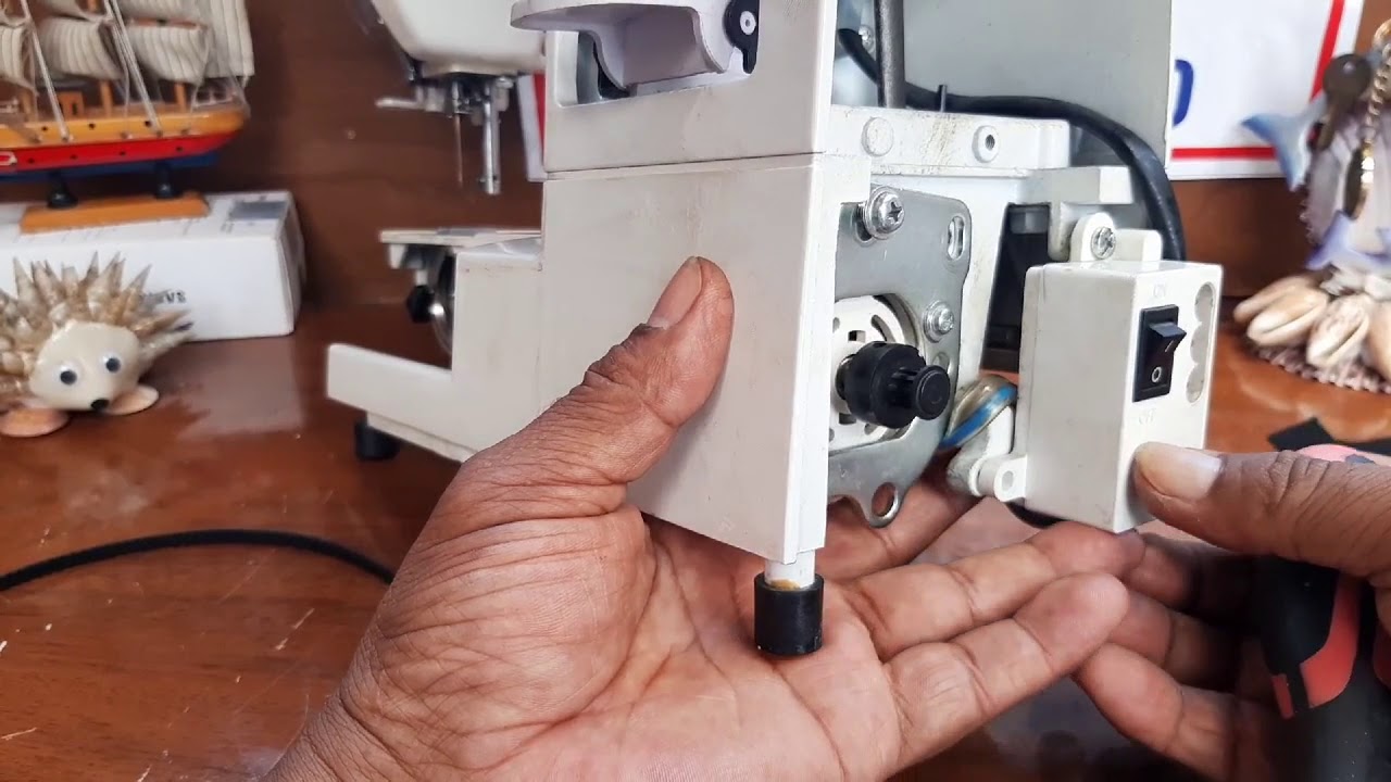 423S Sacar y Poner Faja del Motor Máq.dCoser JANOME Vertical Frontal