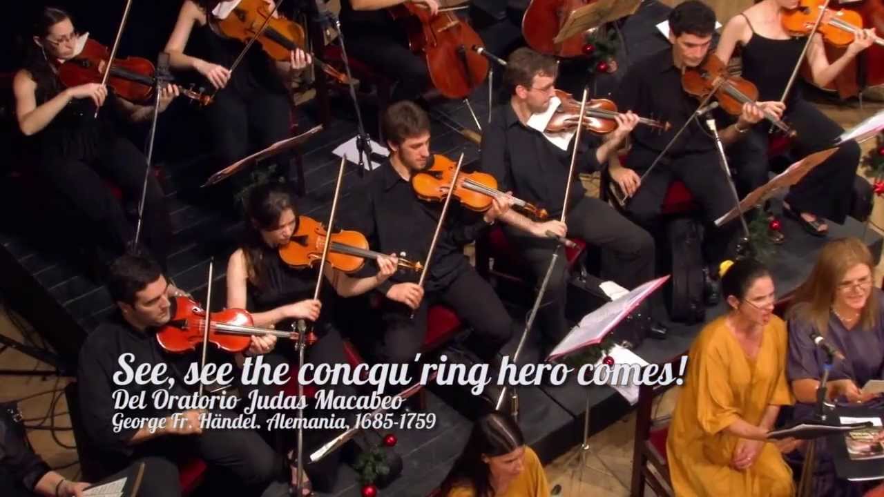 Cantemos La Navidad - See, see the concqu´ring hero comes!
