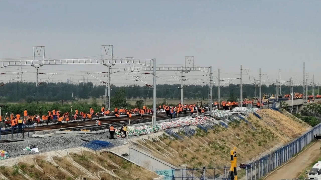 GLOBALink | 12,000 workers upgrade 405km-long railway in 11 hours