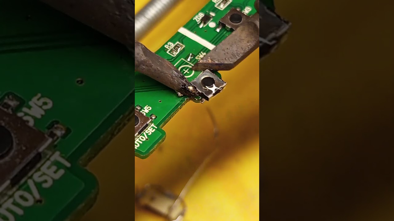 miniature mini push button tactile removed with 2 solder irons monitor tv