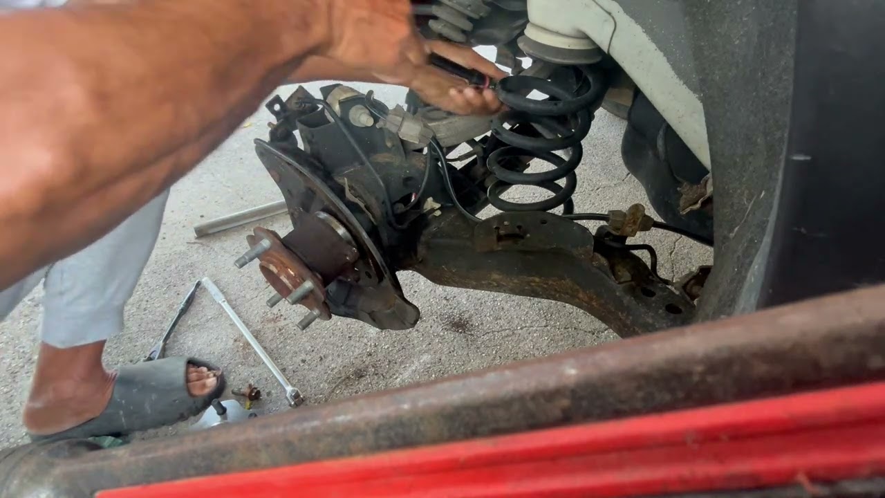 Removal of rear wheel bearing of a Nissan Rogue 2019