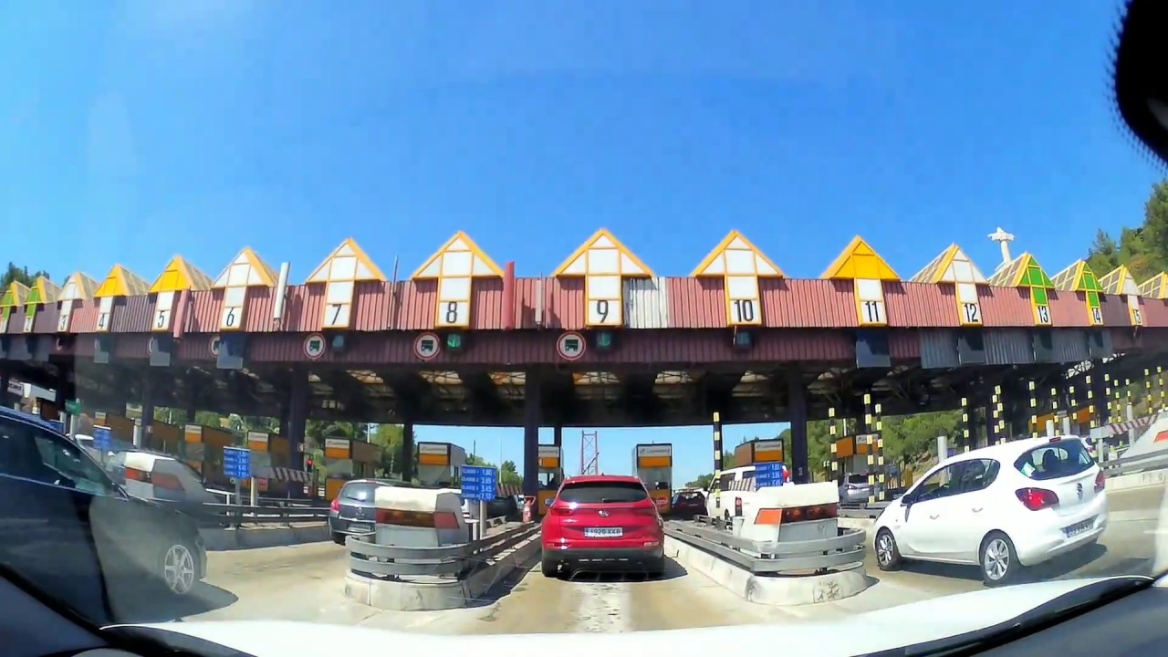 Driving on the Lisbon Bridge - Ponte 25 de Abril - Portugal