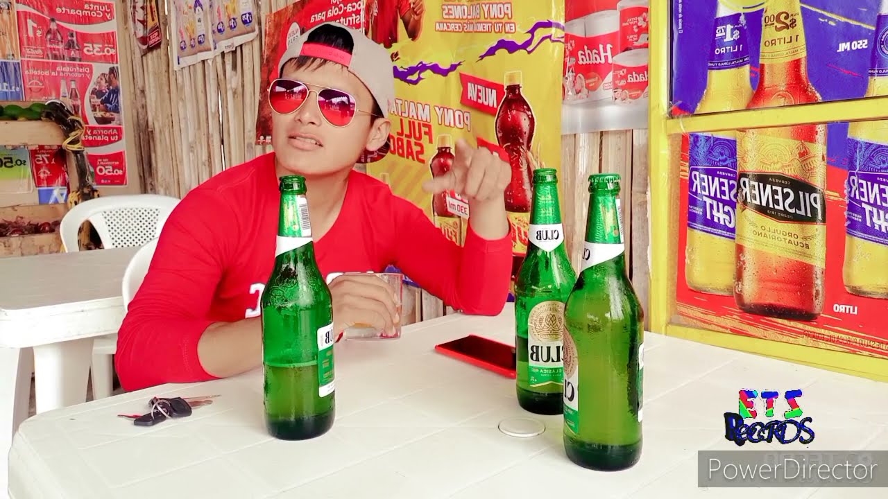 EDER EL NENE DE LA CUMBIA. camino por las calles cerveza en la mano