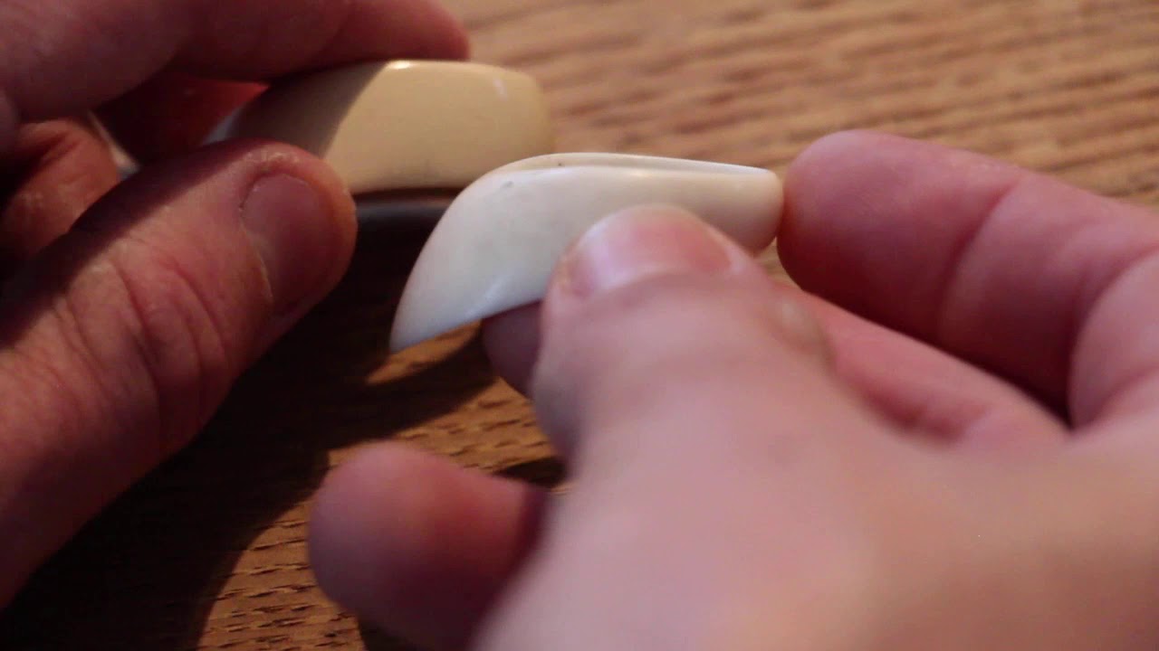 Vermil Lotus ring and cow bone thumb ring